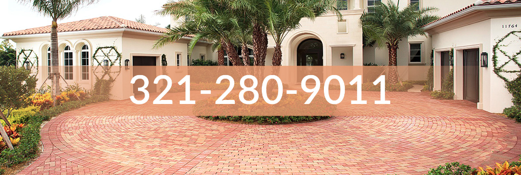 Photo of circular driveway with red brick pavers, click to call image with Brevard Pro Pavers phone number. 