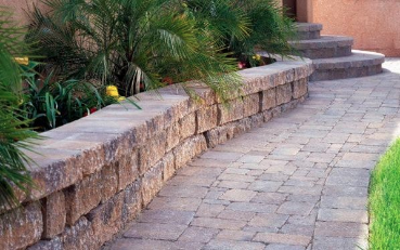 Picture of paver retaining wall installation in Mims Florida.
