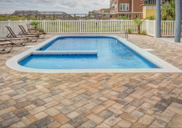 Final photos of an installation for a paver pool deck in south Florida.